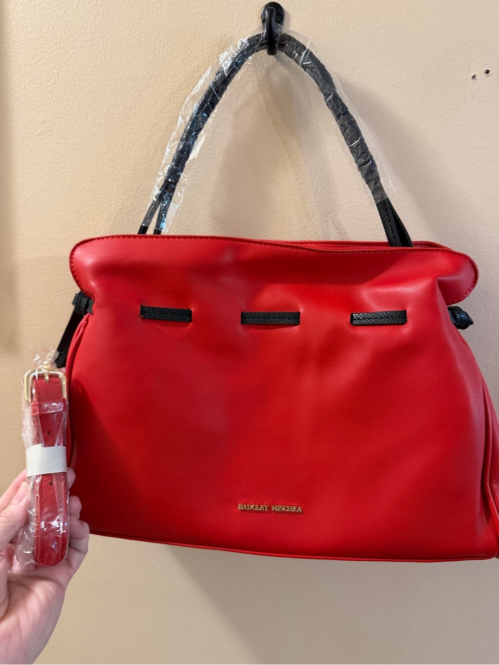 Badgley Mischka Red Shoulder Bag with Black Trim with crossbody strap